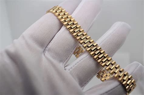 Rolex style gold bracelet